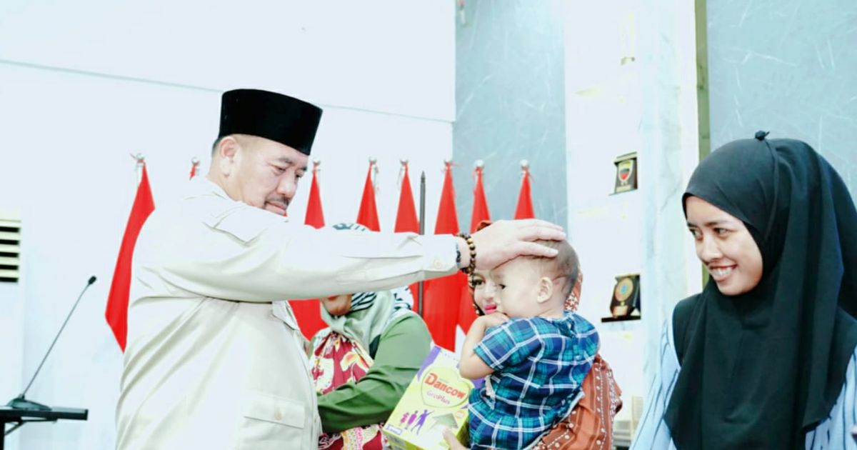Peduli Tumbuh Kembang Anak, Bupati Batu Bara Bagikan Makanan Bergizi
